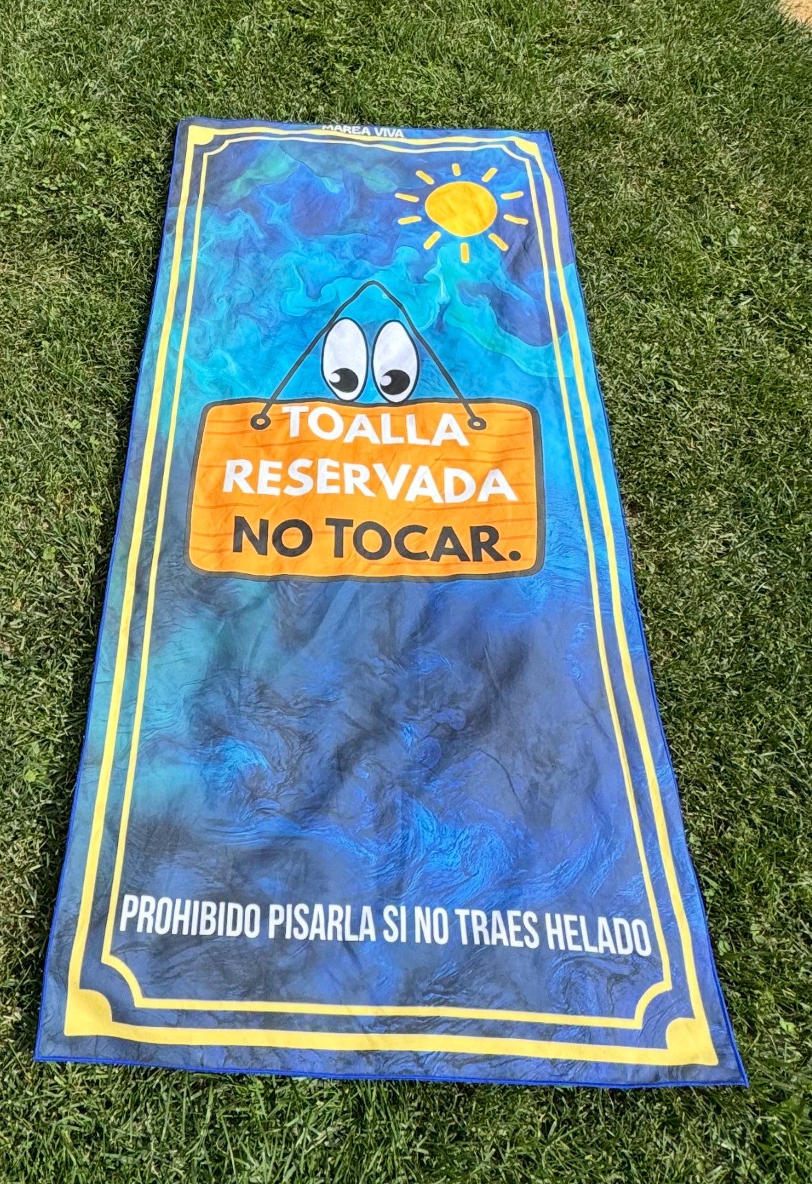 Tu toalla de playa DOMORE — Reservada. No tocar
