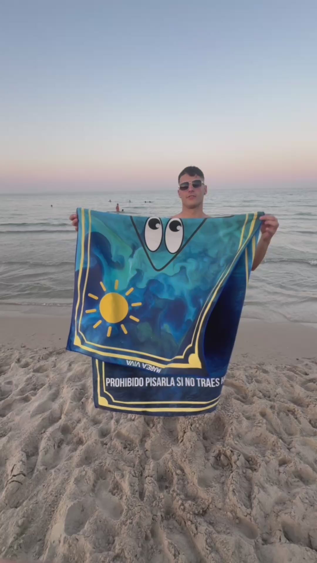 Tu toalla de playa DOMORE — Reservada. No tocar